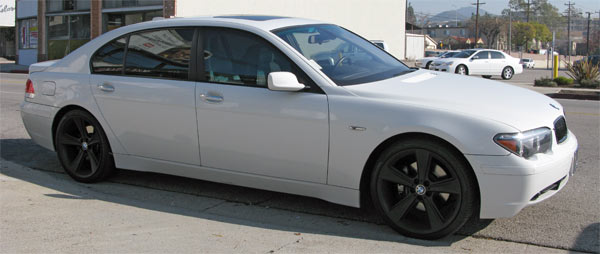 White bmw 745 with black rims #2